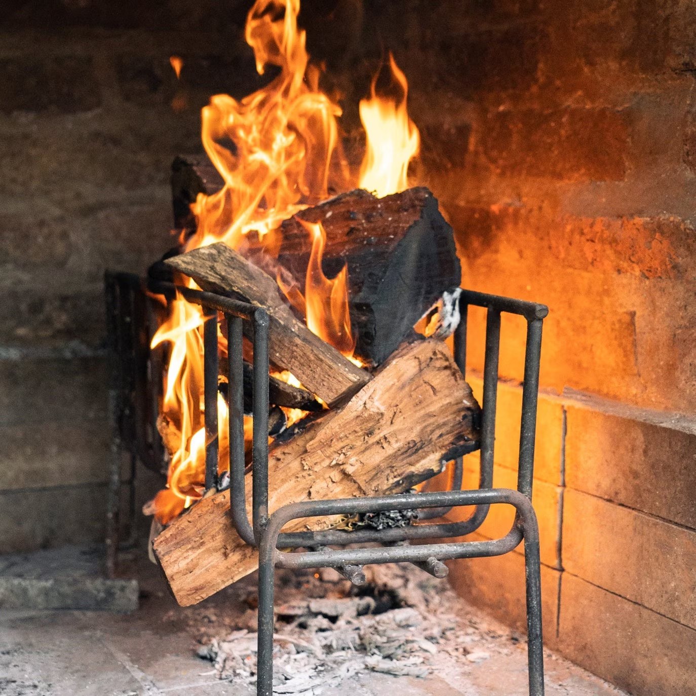 Hardwood logs burning for open fire cooking