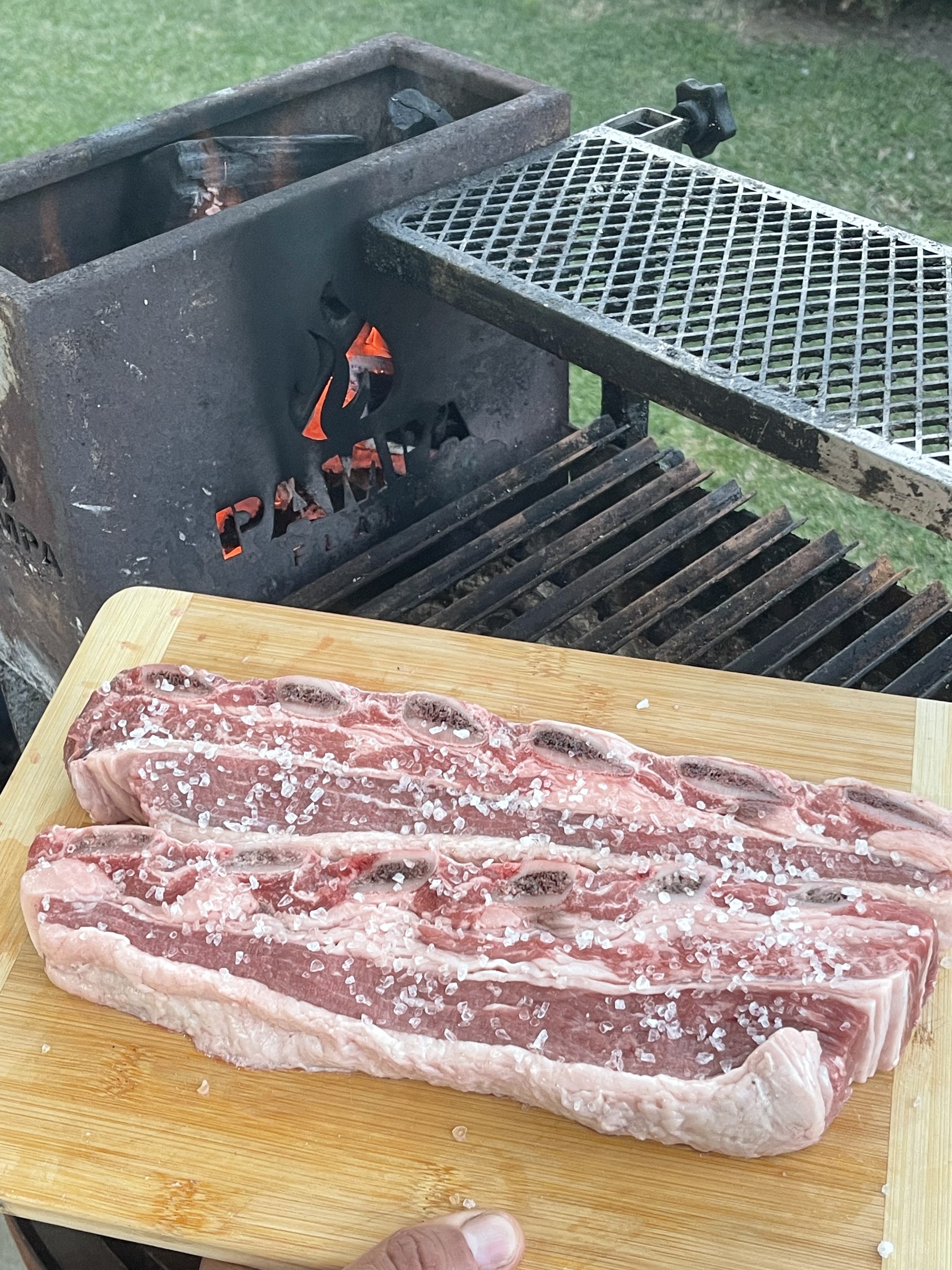 Beef ribs seasoned with salt ready for the Pampa Flame parrilla