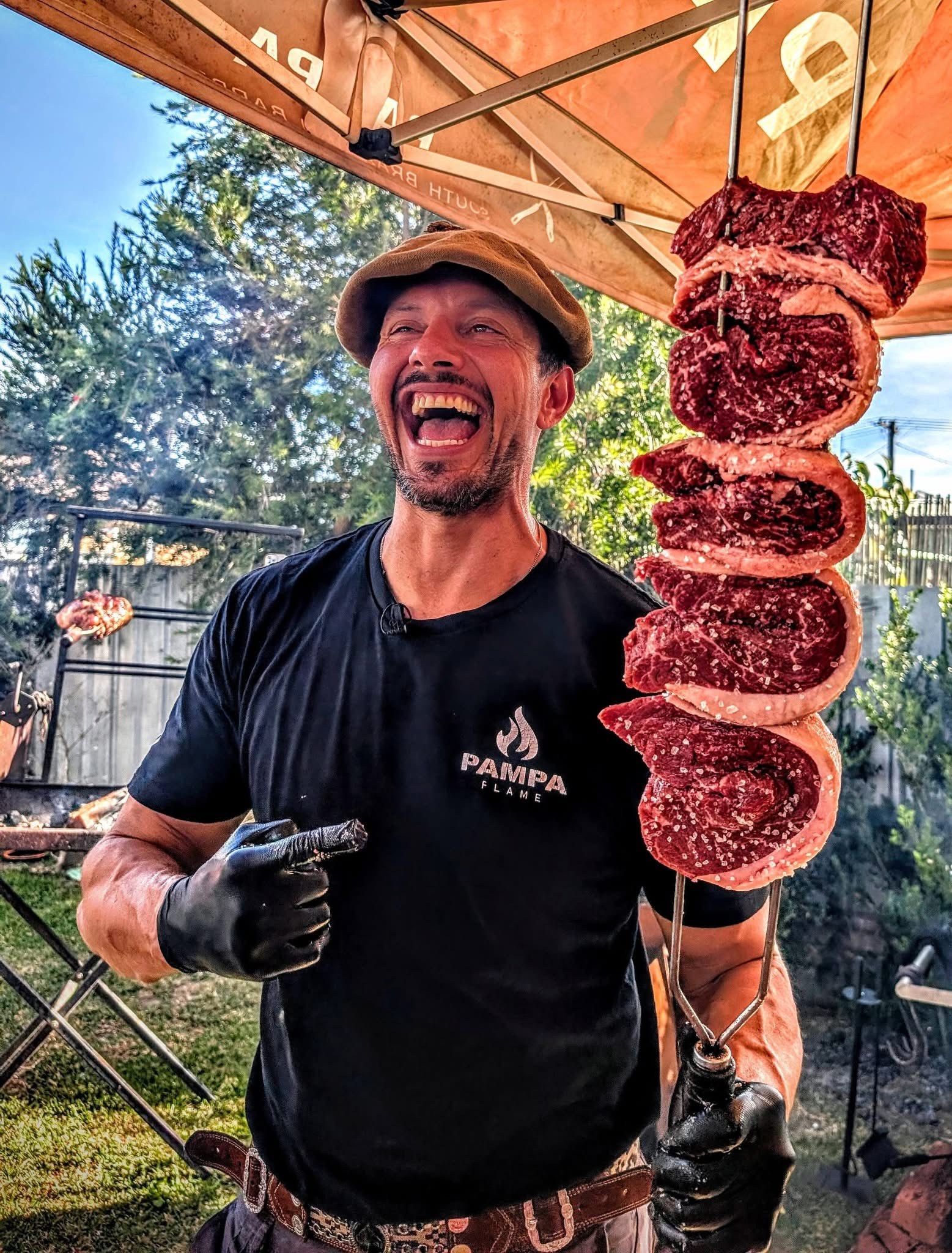 Givago with picanha on espeto skewer over open fire