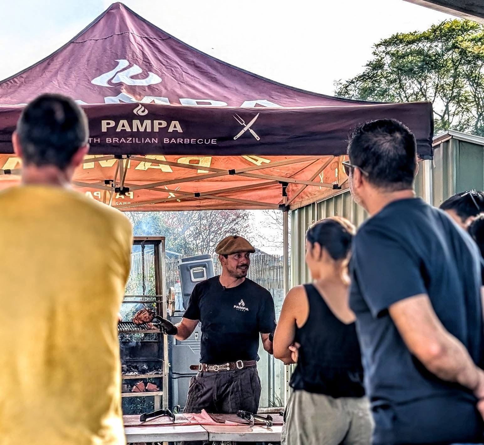 Givago demonstrating open fire BBQ for beginners